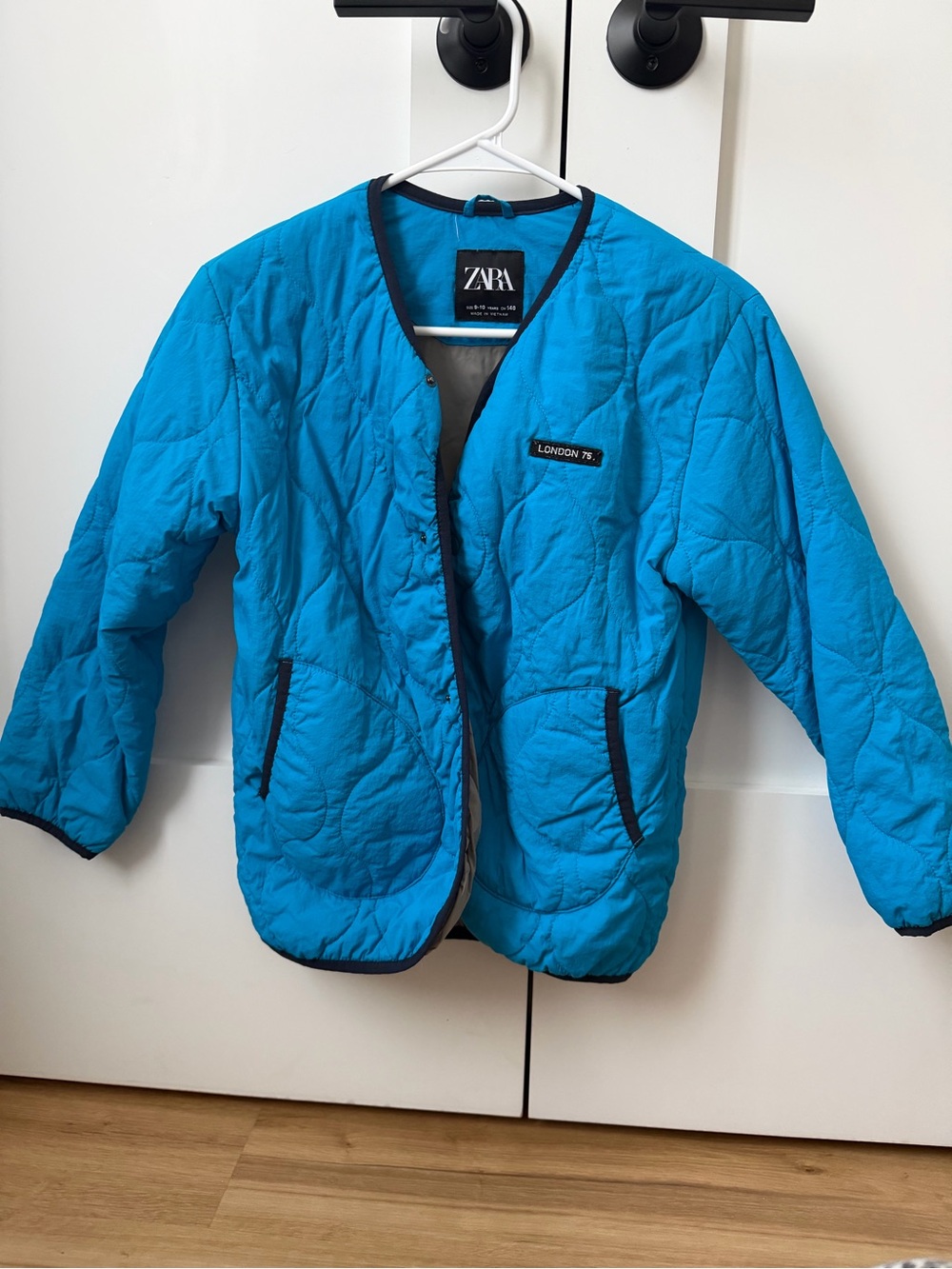 ZARA Bright Turquoise Quilted Puffer Jacket with Black Trim